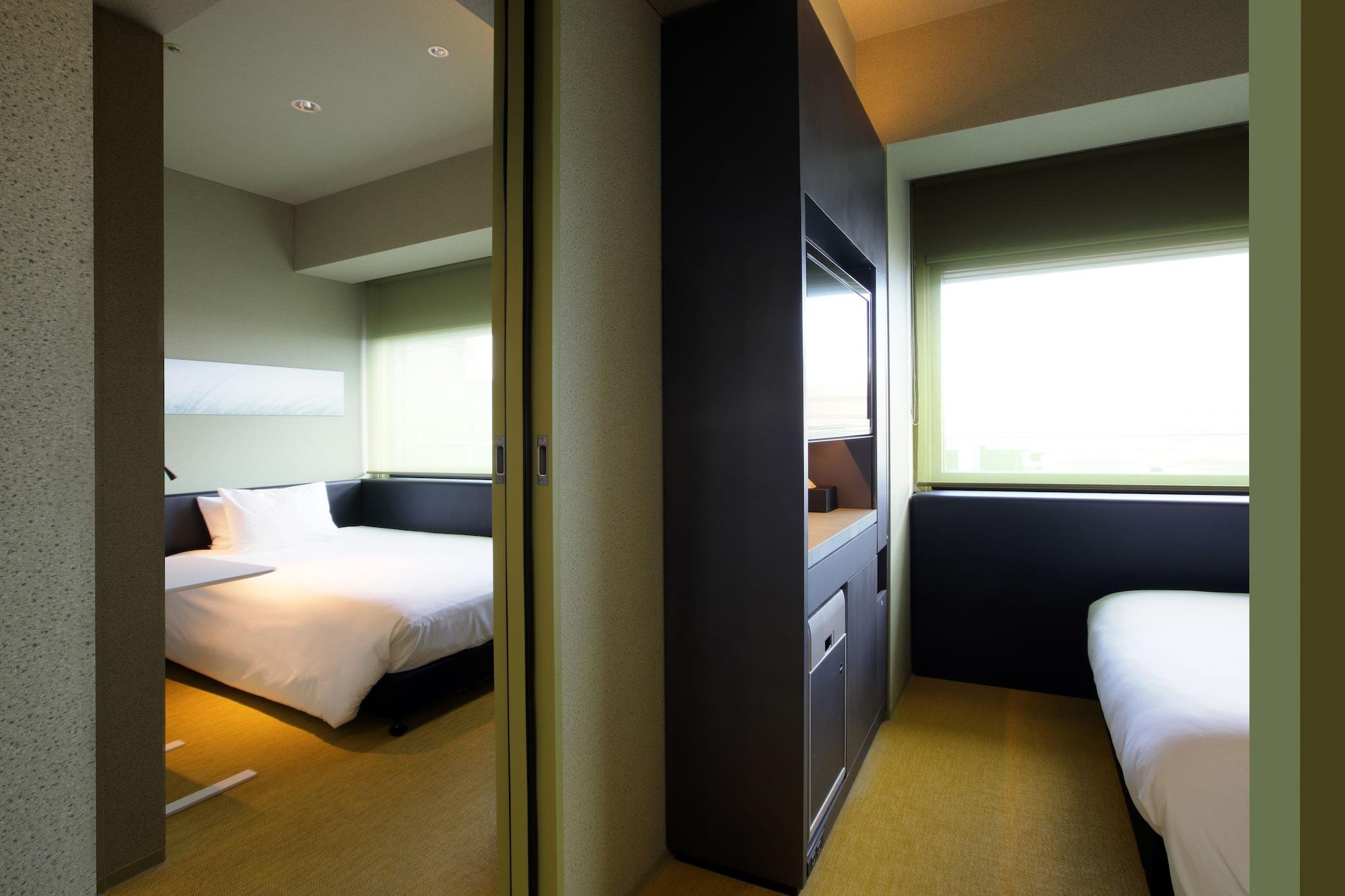 Remm Shin-Osaka Hotell Exteriör bild